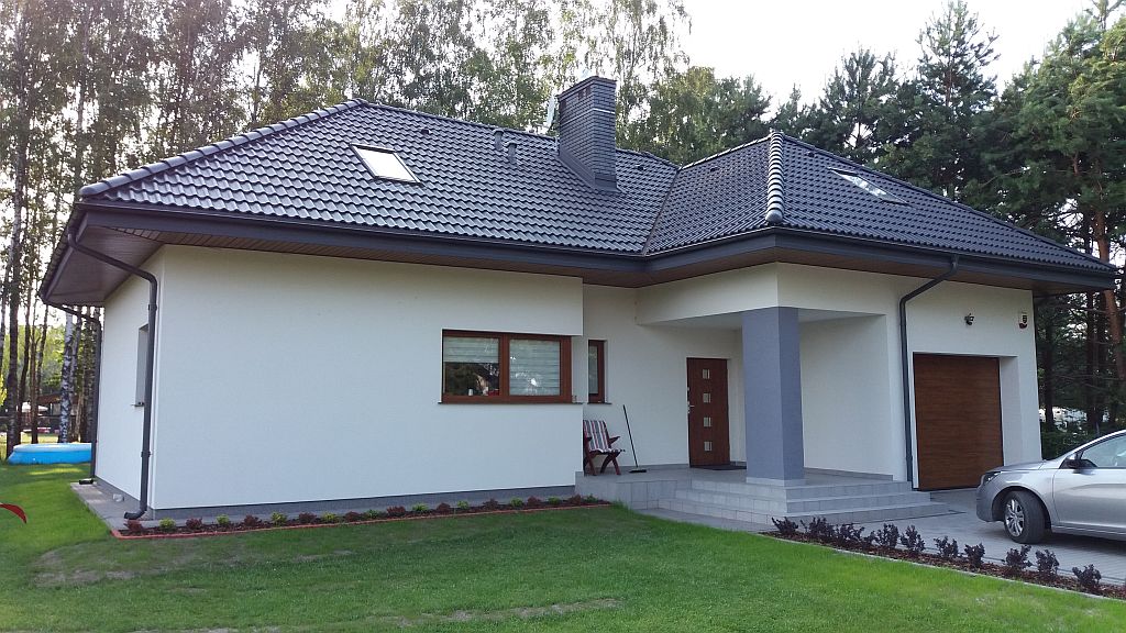Klasyczny jasny dom jednorodzinny koło Warszawy - powiat Grodziski Cdevelopment - budowa domów warszawa